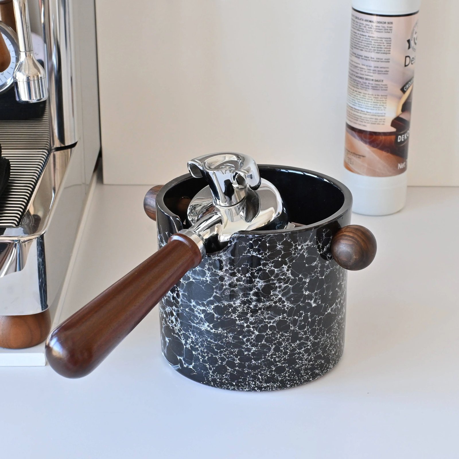 A clean home office setup prepared for researching coffee machine technical support questions.