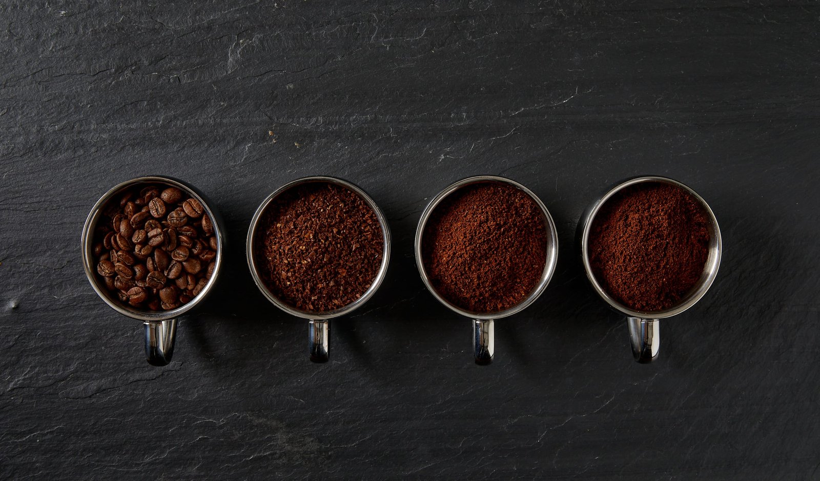 A thermometer measuring the temperature of coffee as it brews from a machine.