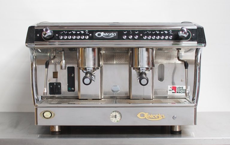 A professional Astoria Gloria SAE 2 espresso machine displayed on a cafe counter.